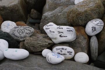 South Island message on a stone
